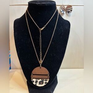 1945 necklace & matching earrings. Wood and faux animal cloth. Gold toned chain